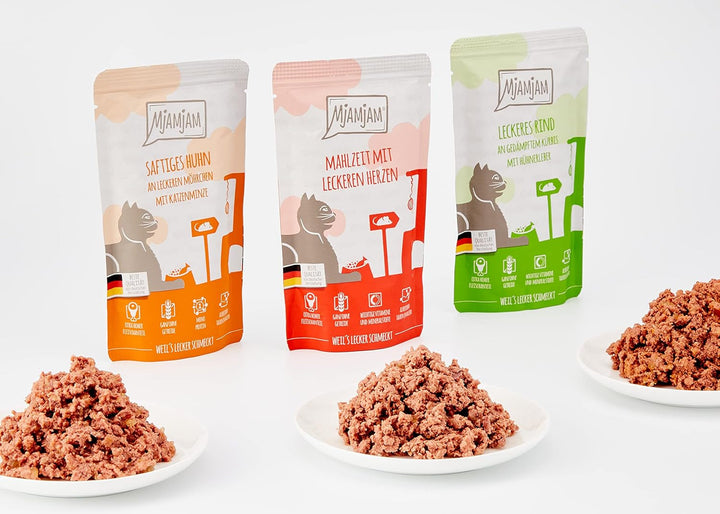 Mjamjam - Hrană umedă premium pentru pisici - Mixpack I - pui, vită, inimi, pachet de 12 (12 X 125 G), fără cereale cu extra carne
