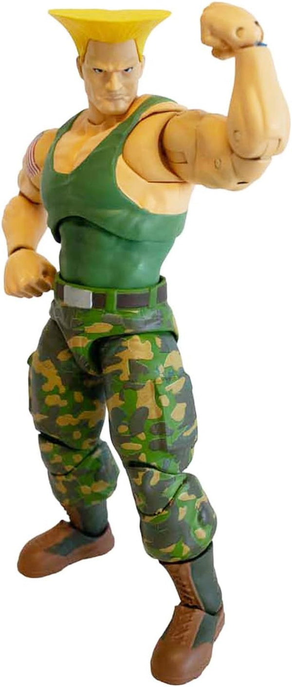 Jada Toys Street Fighter Figure Guile (15 Cm) - Personaj mobil de colecție și de acțiune din Street Fighter 2: The Final Challengers, cu cap, mâini și accesorii alternative, vârsta 13+