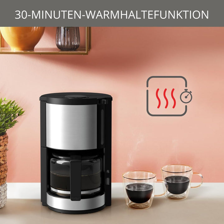 Cafetieră cu filtru Krups KM3210 Pro Aroma plus, 10 cești, 1,25 litri, funcție de menținere a căldurii timp de 30 de minute, fereastră vizibilă pentru nivelul apei, sistem anti-picurare, negru Cu aplicații din oțel inoxidabil