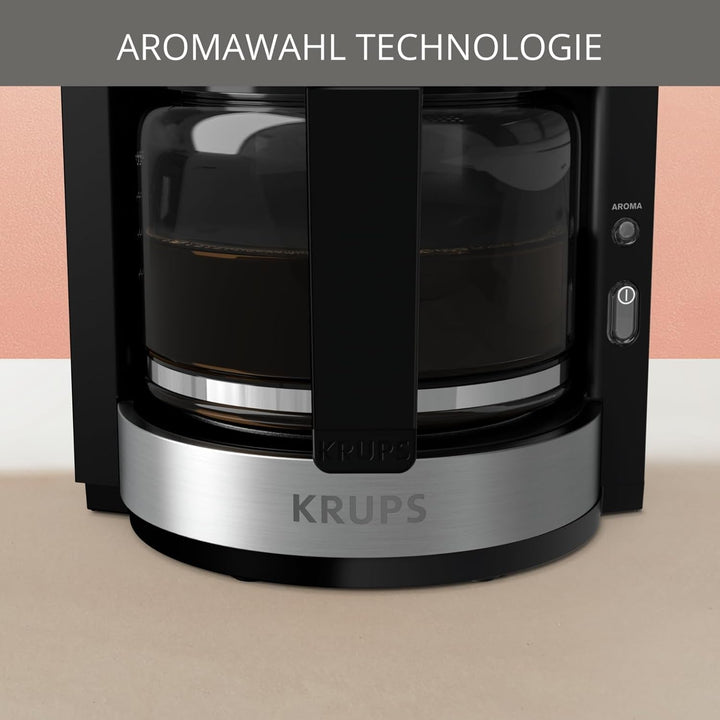 Cafetieră cu filtru Krups KM3210 Pro Aroma plus, 10 cești, 1,25 litri, funcție de menținere a căldurii timp de 30 de minute, fereastră vizibilă pentru nivelul apei, sistem anti-picurare, negru Cu aplicații din oțel inoxidabil