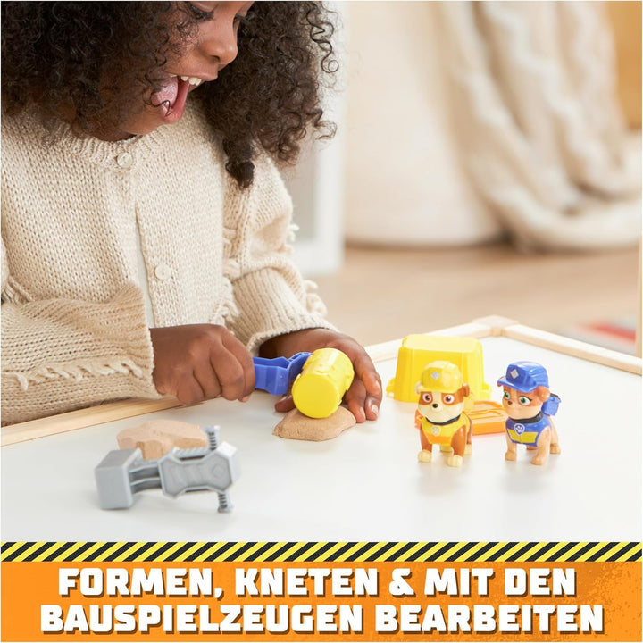 Rubble & Crew - Set de figurine de acțiune cu figurină Rubble & Mix, 2 jucării de construcție și 85G nisip cinetic de construcție, jucărie potrivită pentru copii de la 3 ani în sus