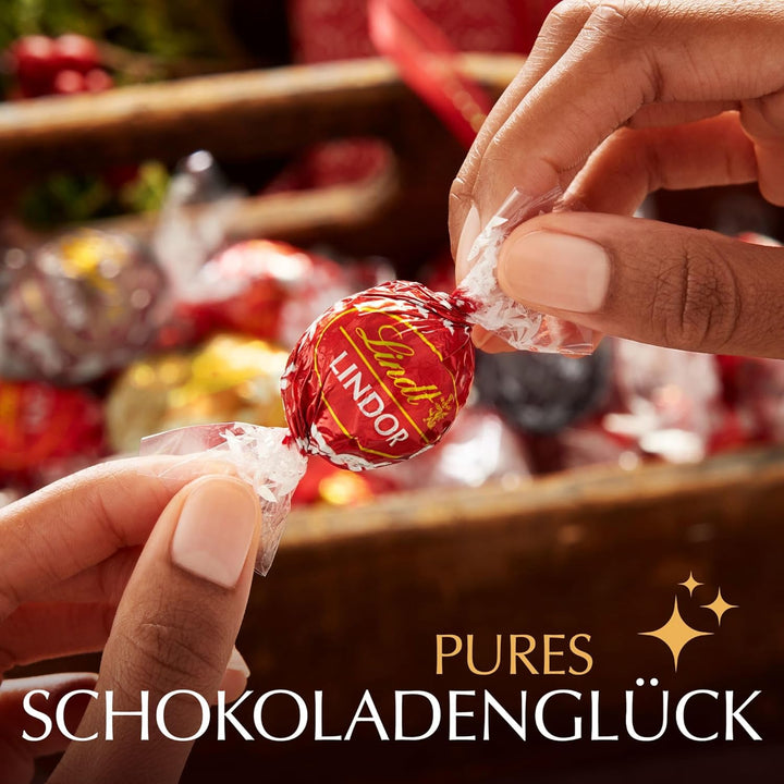 Lindt Schokolade LINDOR Kugeln Mischung | 323 G in Kissenpackung | Ca. 25 LINDOR Kugeln (Vollmilch, Feinherb, Weiß) | Pralinen-Geschenk Oder Schokoladengeschenk