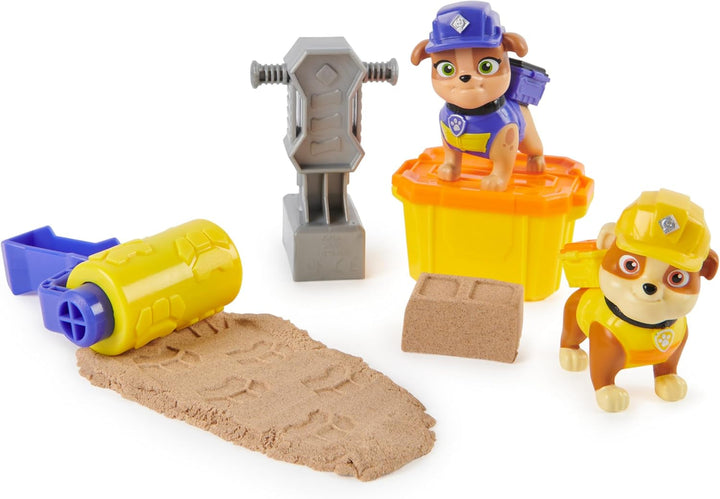 Rubble & Crew - Set de figurine de acțiune cu figurină Rubble & Mix, 2 jucării de construcție și 85G nisip cinetic de construcție, jucărie potrivită pentru copii de la 3 ani în sus