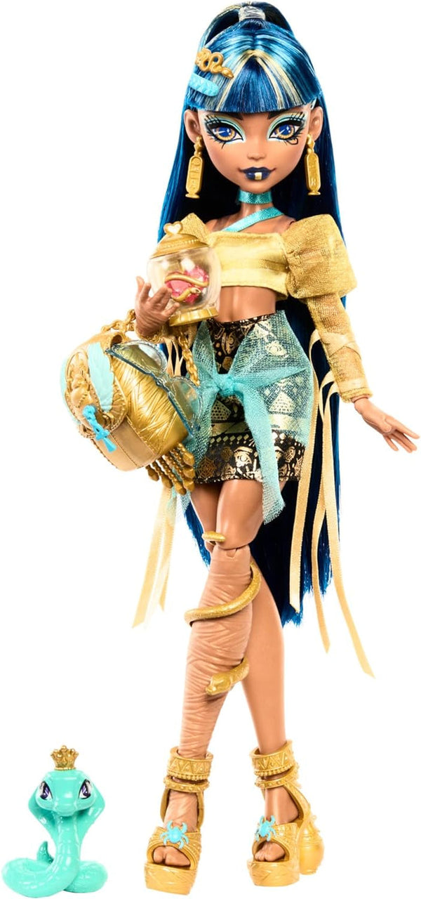 Păpușă Monster High Cleo De Nile în bluză aurie și fustă stratificată, include animal de companie Cobra Hissette și accesorii precum rucsac, gustare și rolă de hârtie, HXH74