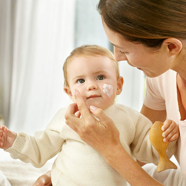 WELEDA Organic Baby Calendula Wind & Weather Balm - Cremă de față și cremă de mâini pentru cosmetice naturale cu ulei de migdale și ulei de susan pentru a proteja pielea sensibilă și uscată a bebelușului de vreme aspră și frig (1x 30 ml)