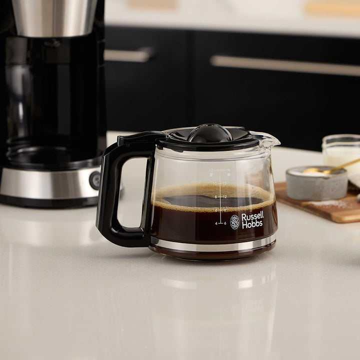 Cafetieră Russell Hobbs (filtru de cafea, ulcior de sticlă de 1,25L, 10 cești, funcție de menținere la cald 40 min., oprire prin picurare, oțel inoxidabil periat, funcție Brew-Now, lumină albastră) Heaton 27400-56