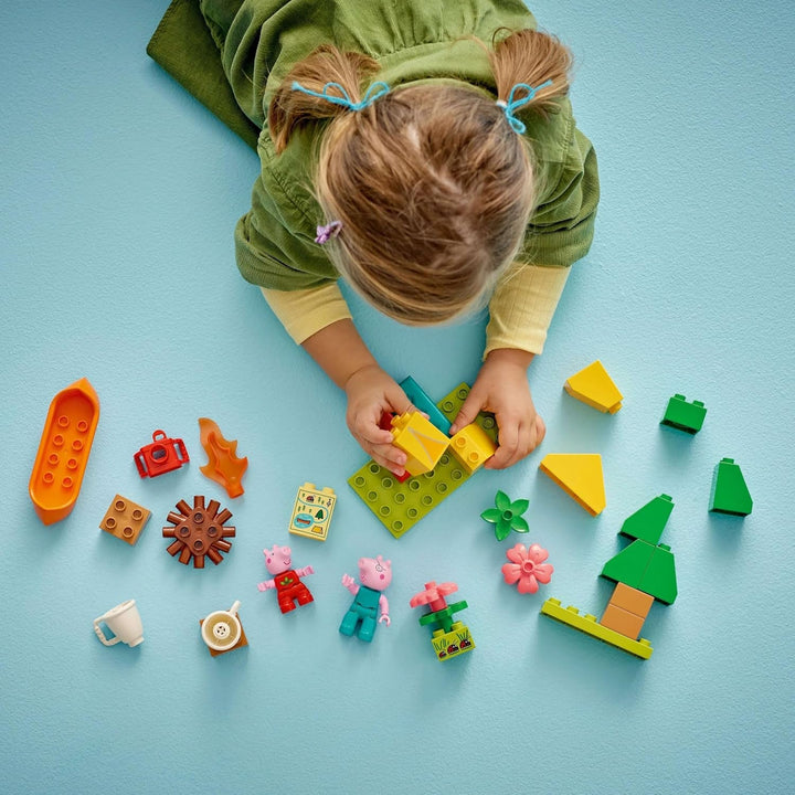 LEGO DUPLO Peppa Wutz Camping Trip - jucărie educativă pentru băieți și fete de la 2 ani - include cort, canoe, foc de tabără și 2 minifigurine - jucărie pentru activități motorii, sortare după culoare 10452