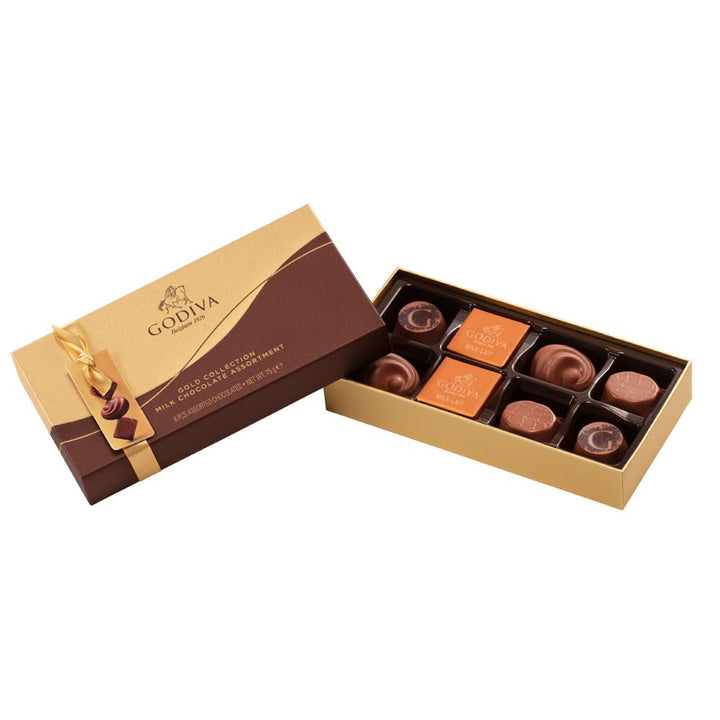 Ciocolată Godiva Connoisseur combinată cu fructul pasiunii, mousse de vanilie, caramel și alte umpluturi delicioase 