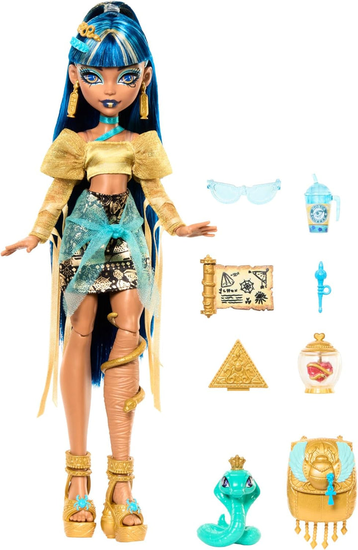 Păpușă Monster High Cleo De Nile în bluză aurie și fustă stratificată, include animal de companie Cobra Hissette și accesorii precum rucsac, gustare și rolă de hârtie, HXH74